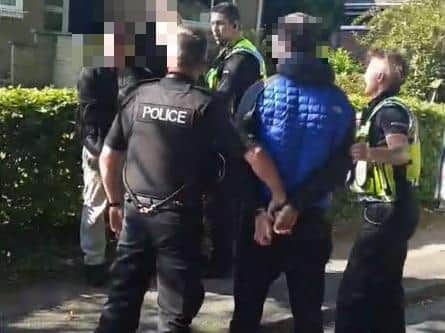 Officers detained three young men and a young woman in Glenway, a quiet cul-de-sac off Cop Lane, Penwortham. Pic credit: Dan Dixon