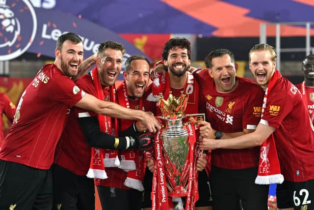 Andy Lonergan with the Liverpool keepers, coaches and the Premier League trophy this summer (Getty Images)