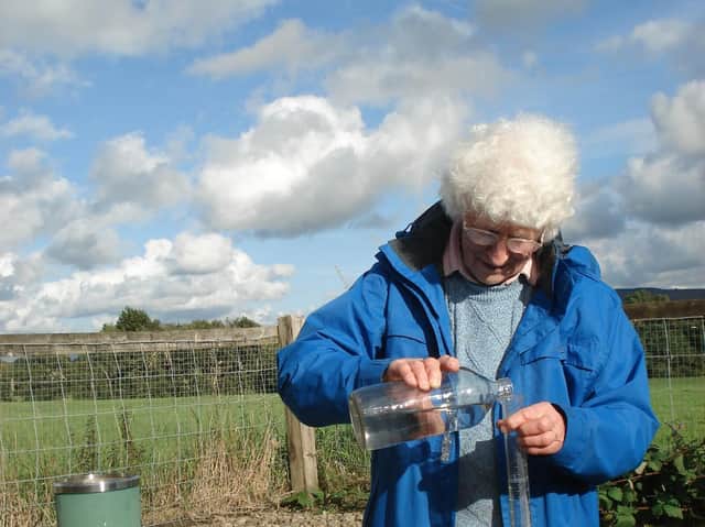Muriel Lord checks out the latest weather measurements