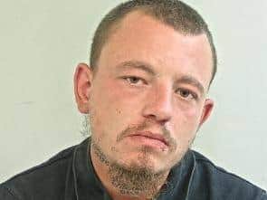 Sean Fisher (pictured) is wanted by police in connection with an arson investigation in Chorley. (Credit: Lancashire Police)