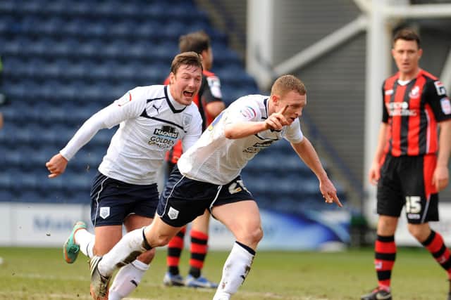 Stuart Beavon celebrates with Lee Holmes after giving Preston the lead against Bournemouth