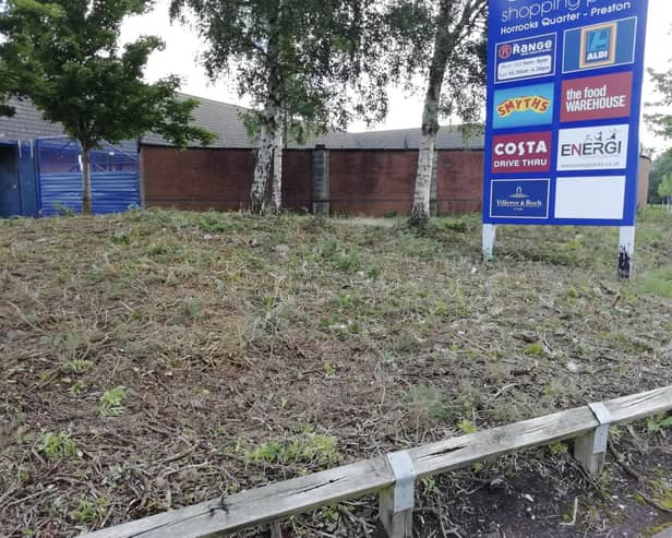 The retail park mowed down the bushes after reports of homeless people camping there.
