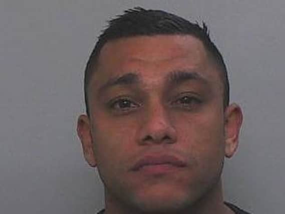Adam Yusif Bhamji is wanted by Lancashire Police