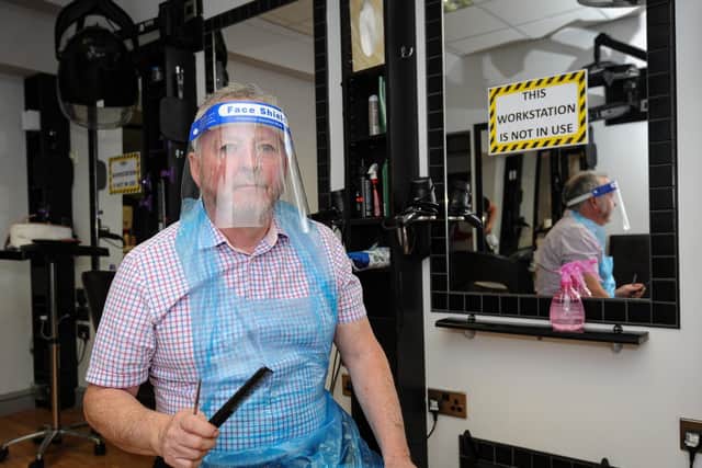 As part of the new official guidelines for hairdressers and salons, staffhave had to implement strict social distancing rules and erect perspex screens, with staff wearing visors.