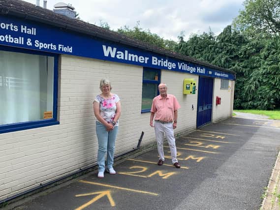 Maureen Nicoll (secretary) and Richard Garside (chairman) of Walmer Bridge Village Hall Association