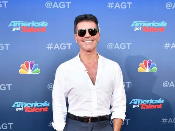 Simon Cowell is due to have surgery on his broken back