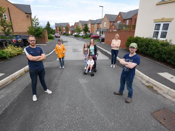 A group of residents claim that Morris Homes has left work undone in St Jamess Field in Wateringpool Lane, Lostock Hall, for three years.