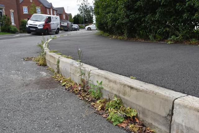 They add that the kerbs are too deep and the estate is not weeded regularly.