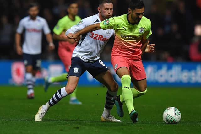 Preston North End's Alan Browne battles with Manchester City's Ilkay Gundogan in the Carabo Cup