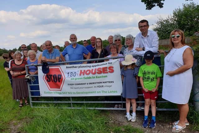 Protestors pictured last year at the now approved Pear Tree Lane site in Euxton