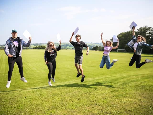 A Level students jump for joy at Westholme  School