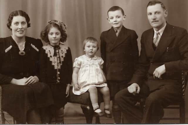 Edward and Martha Rozier with their children David, Barbara (left) and Maureen (centre)