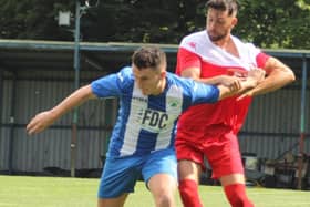 Longridge (red strip) won 3-0 at Fulwood Amateurs on Saturday (photo: Steven Taylor Photography)