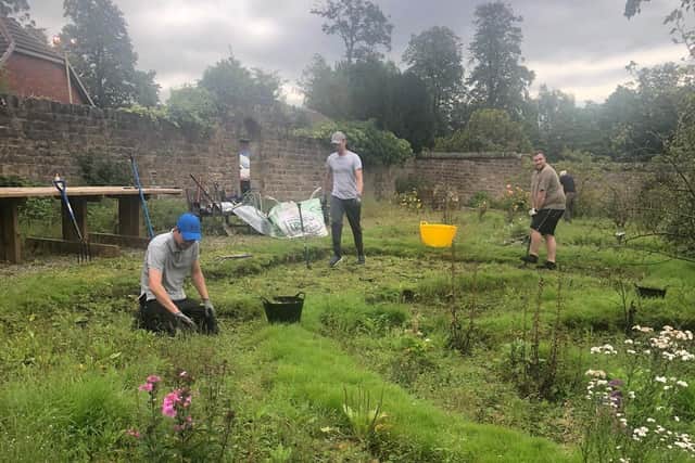 The volunteering day saw people carry out gardening jobs