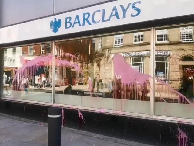 The 62-year-old woman from Preston was arrested after pink paint was splashed across the windows of Barclays bank in Fishergate on Saturday, August 15