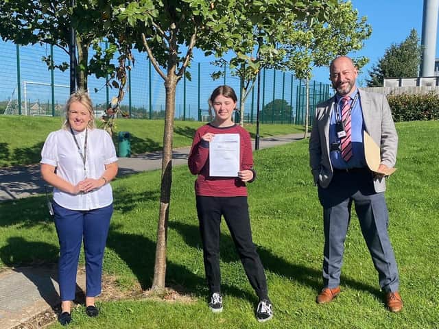 Fulwood Academy head girl Lucy Corner collects her GCSE results accompanied by Katie Kaye, Assistant Principal.and school vice principal Lee Mr McLinden
