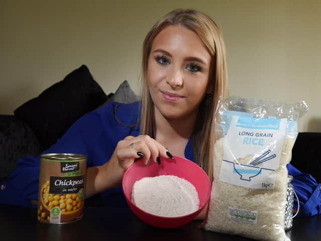 Estelle with some of the basic rations she will have to live on