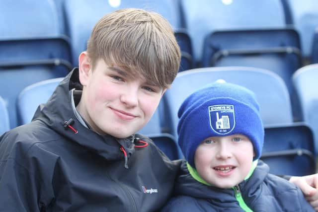 Two Preston North End fans at Deepdale for the QPR fixture in March