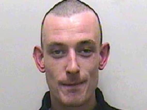 Michael Foster, 32, is still wanted 6 weeks after a woman suffered a serious sexual assault in Preston. Pic: Lancashire Police