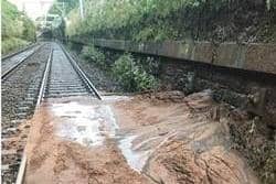 The landslip happened between Buckshaw Parkway and Chorley and is causing disruption to trains running along the line between Preston and Bolton