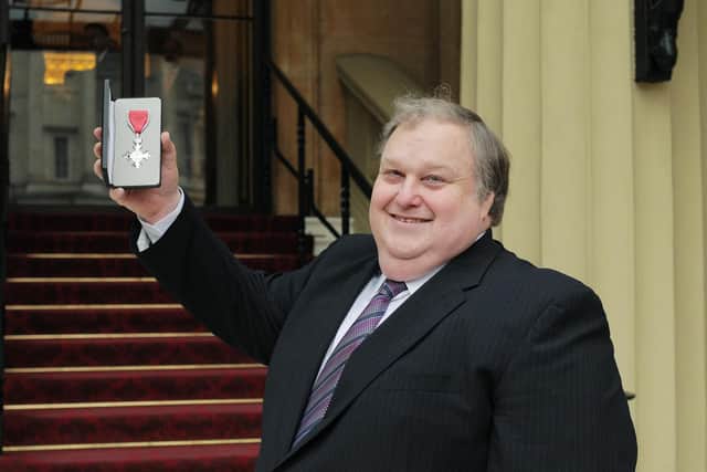 Receiving his MBE in 2017