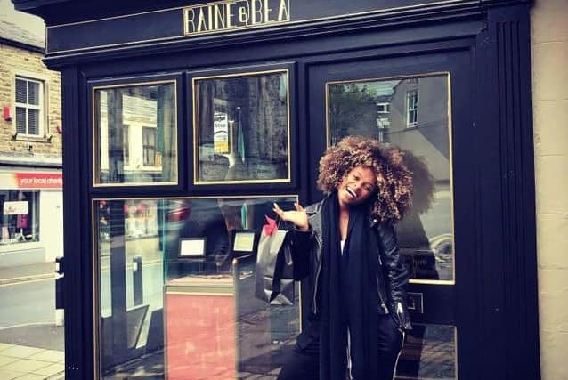 Fleur East outside Raine & Bea's Clitheroe store: the smallest lingerie boutique in the UK.