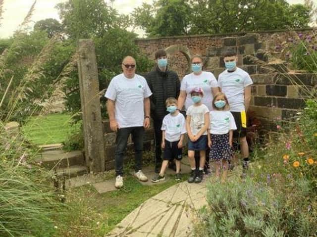 Mayor of Chorley, councillor Steve Holgate, left, prepares for the walk with his family