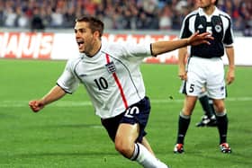 Michael Owen celebrates scoring his second goal against Germany