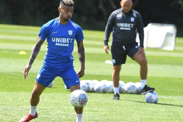 Josh Ginnelly in training last season watched by PNE manager Alex Neil