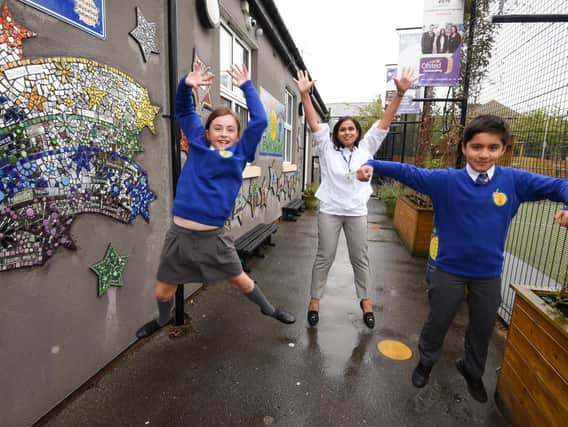 Eldon Primary School headteacher and  pupils celebrate the the start of a new academic  year - back in class