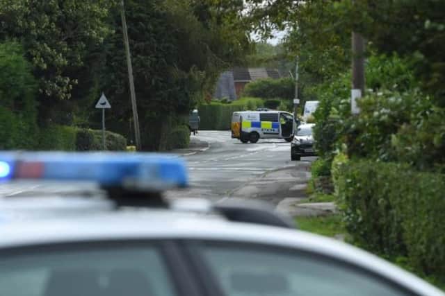 The road was closed for several hours while officers carried out a search.
