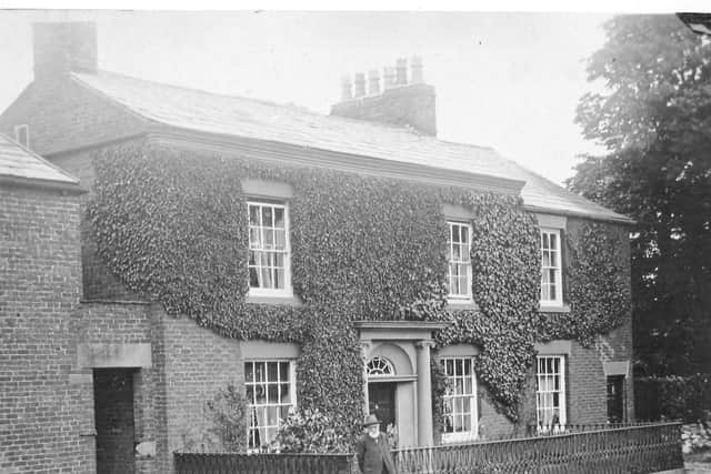 Thomas Cross Wignall standing outside Grove House, Freckleton. Three generations of Wignall family were leading members of the Freckleton Wesleyan Methodist community