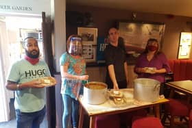 From left - Dee Singh, Ruby Abram, Frank Oniell and Julie Cotton serving hot meals as part of the Help for Humanity group