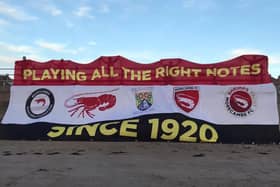 The Eric Morecambe-inspired centenary Shrimps banner