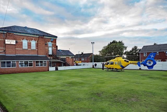 The air ambulance touching down on the bowling green at Bamber Bridge Conservative Club shortly before 7pm last night (Wednesday, September 9). Pic: Mike Inkley/MJP Media