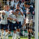 Stephen Elliott is congratulated by his Preston North End team-mates after scoring against Swansea at Deepdale in September 2009
