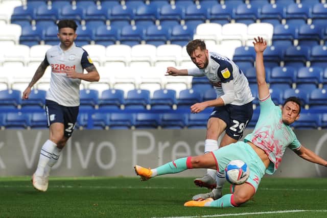 Preston's Tom Barkhuizen sees a shot blocked against Swansea