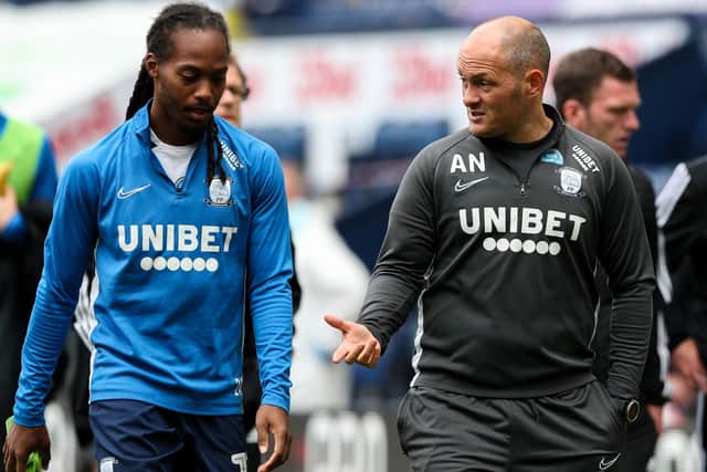 Johnson (left) with Alex Neil pictured last season