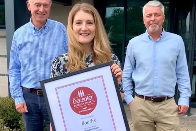 Booths has won a top Decanter wine award. Chairman Edwin Booth, wine buyer Victoria Anderson and head of marketing and trading John Gill