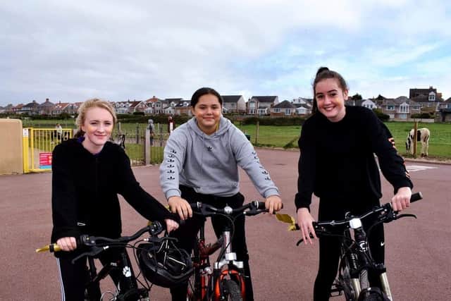 Team Reece cycle ride along Morecambe promenade. Pictured are Niamh, Molly and Suria.