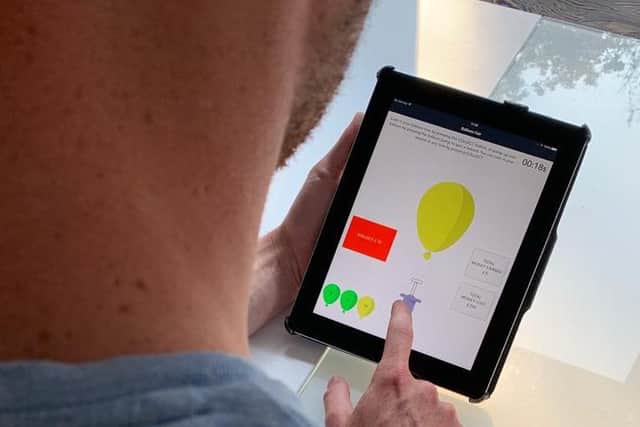 The app produces a series of cognitive assessments to test for the early signs of the illness