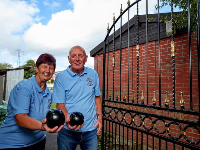 Margaret and Jack Worden with the new gate at St Paul's Bowling Club which has been purchased and installed with money from the Redrow Community fund.
