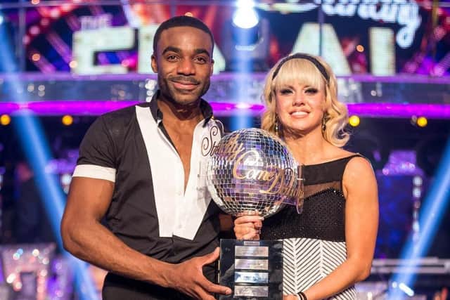 Joanne Clifton and dance partner Ore Oduba lift the Glitterball trophy in Strictly Come Dancing in 2016.