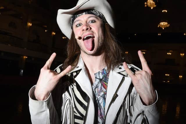 Kevin Clifton as Stacee Jaxx in Rock of Ages in Blackpool Empress Ballroom in 2019.