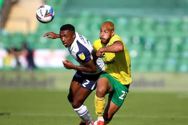 PNE right-back Darnell Fisher battles with Norwich's Onel Hernandez