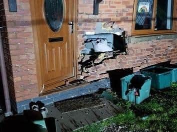 Police are appealing for information after a car was rammed into a house in Morecambe.