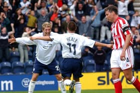 David Healy is congratulated by Richard Cresswell after scoring in PNE's 4-3 win over Stoke at Deepdale