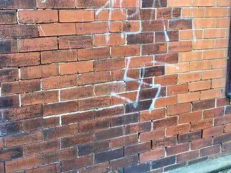 The offensive graffiti was found on Tuesday, September 22 daubed on the wall of The Good Van Company shop in Brook Street, opposite the Brook Tavern pub, in Plungington. Pic: Pav Akhtar