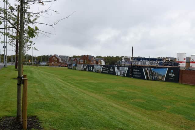 The land at the entrance to the new estate on the former Lostock Hall gasworks site had been earmarked for shops - but now looks set to get more housing
