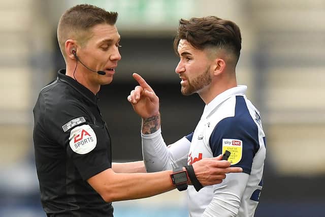 Preston striker Sean Maguire makes his point to referee Matt Donohue during the defeat to Stoke